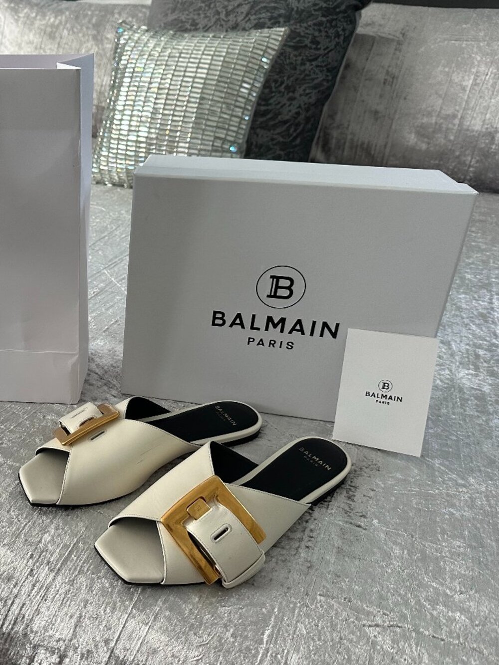 Balmain women's slides.  Cream color with large gold buckle